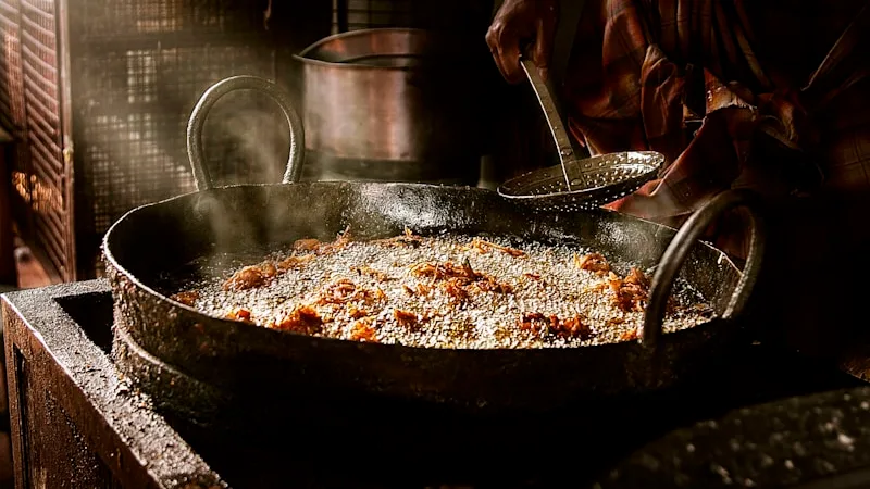 Spice House kitchen with fresh spices and traditional cooking pots